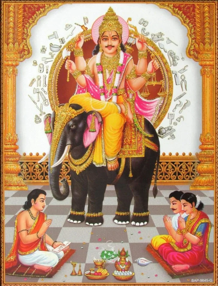 Lord Vishwakarma riding a black elephant with tools in a halo behind him and devotees worshipping below